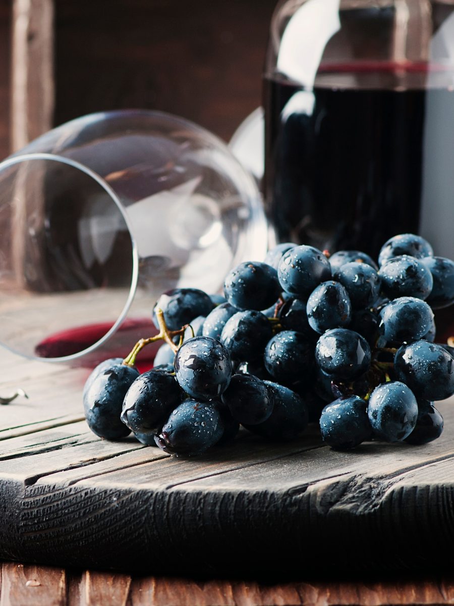 fresh-grape-and-red-wine-on-the-vintage-table.jpg